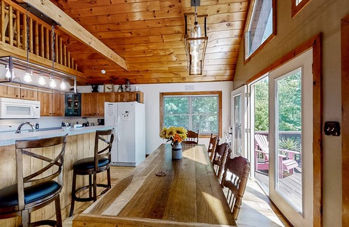 Tazewell Cabin | Lakefront home - dog-friendly, private dock, two fireplaces, and central AC
