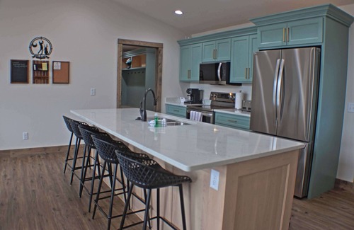 New Lisbon House | Lakefront Home w/Hot Tub & Beach – Sleeps 20