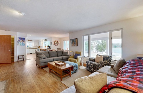 Alden House | Lakefront home w/large yard, sandy beach area, dock, & WIFI, near golf & trails