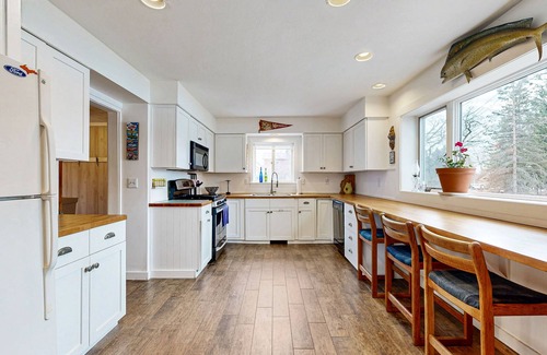 Alden House | Lakefront home w/large yard, sandy beach area, dock, & WIFI, near golf & trails
