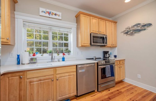 North Shore Acres House | Lakefront Home w/Pool, Lazy River, Dock, Firepit, Kayaks, Games, Pool Table