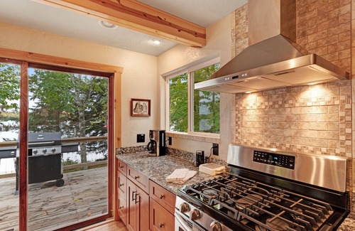 Presque Isle House | Lakefront home with dock, Twin Islands views & trail access