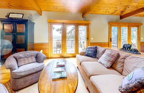 Freedom House | Lakefront home with a private beach, dock, grill, deck, W/D, and AC