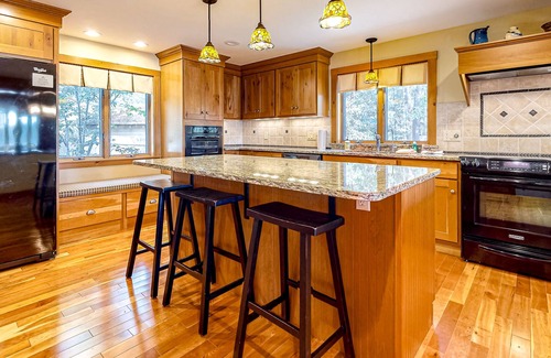 Freedom House | Lakefront home with a private beach, dock, grill, deck, W/D, and AC