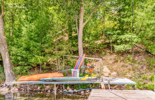 Oxford House | Lakefront home with deck, patio, dock, fire pit, kayak, & gas fireplace