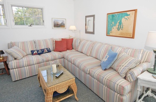 Empire House | Lakefront home with firepit, grill & furnished deck