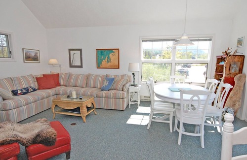Empire House | Lakefront home with firepit, grill & furnished deck