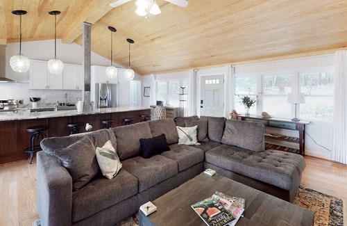Mineral House | Lakefront home with granite counters, fireplace, lake views, & dock