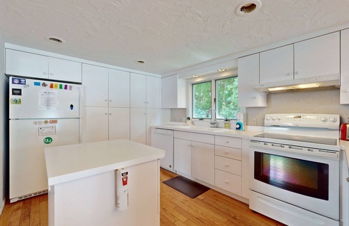 Valois House | Lakefront home with large deck, dock, kayak, & gorgeous views