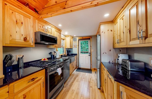 Oxford Cabin | Lakefront home with lovely lake views - one mile from the casino
