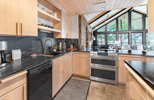 Cedar Creek Reservoir House | Lakefront home with luxury touches. Ample outdoor space for making memories.