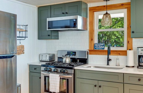 Shapleigh House | Lakefront Home with Sandy Beach! Kayaks, SUP, Pedal boat, and more!