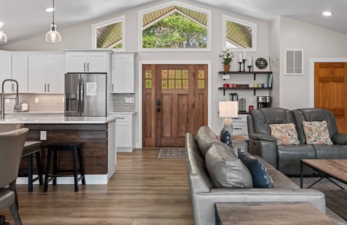 La Follette House | Lakefront home with private hot tub, dock, golf, pool, pickleball, firepit, AC