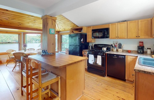 Litchfield Cabin | Lakefront home with firepit, yard, dock/water access, outdoor area, & W/D