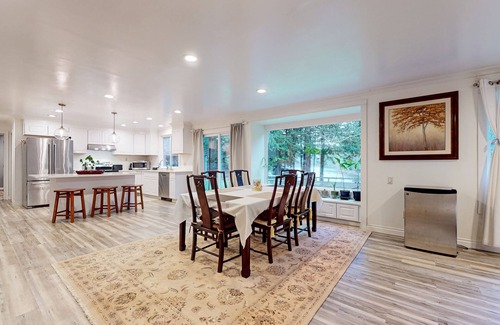 Snoqualmie House | Lakefront home with private dock, lake views, firepit, & wood stove
