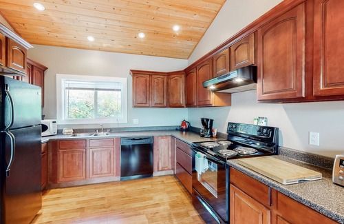 Christina Lake House | Lakefront house with stunning views & trail to private dock with lake access
