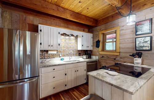 Mineral House | Lakefront house w/waterslide, hot tub, game room, & wood fireplace
