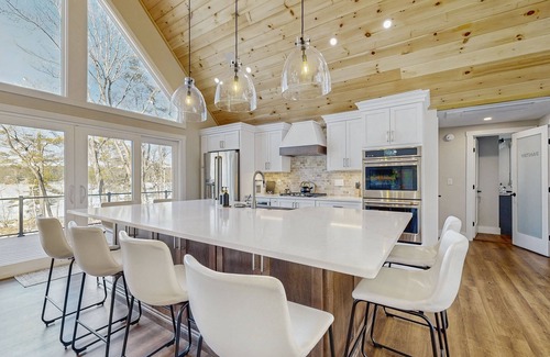 Gray House | Lakefront house with private beach, firepit, dock, 4 kayaks, grill & hot tub