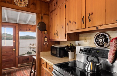 Brant Lake House | Lakefront house with dock, sandy beach, full kitchen, gorgeous views