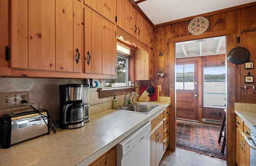 Brant Lake House | Lakefront house with dock, sandy beach, full kitchen, gorgeous views