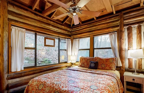 Eureka Springs Cabin | Lakefront log cabin with wrap-around deck, grill, wood stove & new kitchen