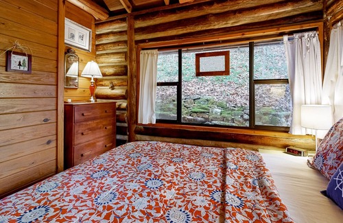 Eureka Springs Cabin | Lakefront log cabin with wrap-around deck, grill, wood stove & new kitchen