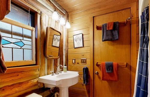 Eureka Springs Cabin | Lakefront log cabin with wrap-around deck, grill, wood stove & new kitchen