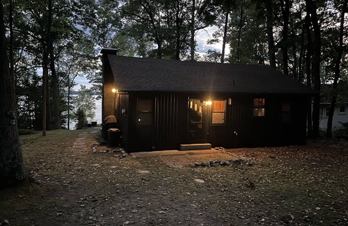 Carp Lake Cottage | Lakefront Log Cabin with Contemporary touches