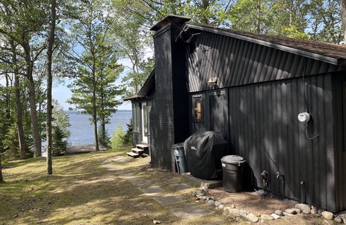 Carp Lake Cottage | Lakefront Log Cabin with Contemporary touches