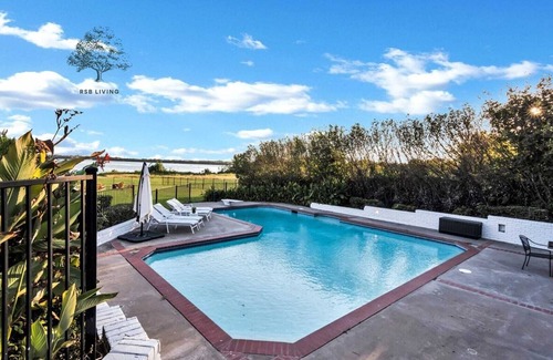 Rowlett Villa | Lakefront Luxe 6BR/4.5B Home with Pool & Hot Tub