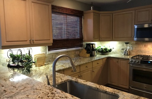 New London House | Lakefront Luxe Retreat in Tranquil Cove Endless Enjoyment Lakeside Fireplace