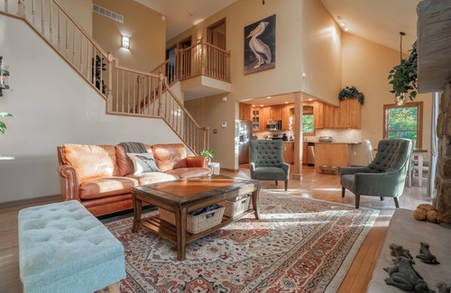 East Stroudsburg House | Lakefront Mansion w/3 Decks, Hot Tub, Boats, & Game Room!