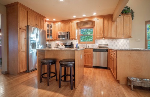 East Stroudsburg House | Lakefront Mansion w/3 Decks, Hot Tub, Boats, & Game Room!