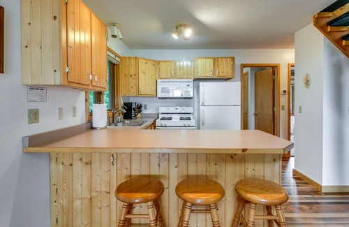 Isle Cabin | Lakefront Minnesota Abode - Fire Pit, Deck & Grill