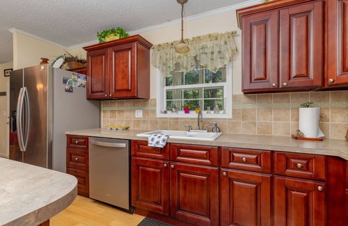 Moratuck Manor House | Lakefront, Pet Friendly, Dock, Fireplace, Kayak, Cornhole, Grill