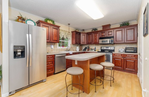 Moratuck Manor House | Lakefront, Pet Friendly, Dock, Fireplace, Kayak, Cornhole, Grill