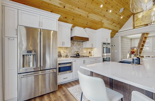 Gray House | Lakefront properties with private beach, hot tub, dock, kayaks, grill & firepit