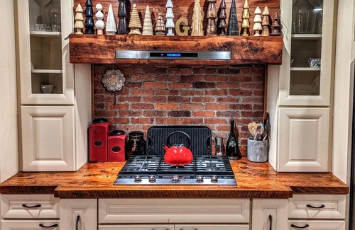 Woodstock House | Lakefront Retreat with Private Beach, Gourmet Kitchen, Game Room & Movie Space