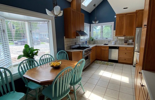 Brighton House | Lakefront Retreat Made Easy with Hot Tub, Lake Toys, Yard Games and Essentials