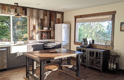 Bigfork House | Lakefront retreat w/private dock, SUPs & fast WiFi - walk to restaurants!