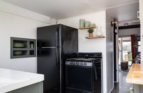 Bitely Cottage | Lakefront Tiny-Home w/ HotTub, Sauna, Pontoon, & Kayaks