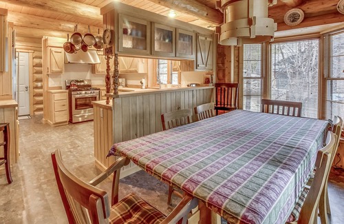 Sandpoint House | Lakefront true log home w/private hot tub, dock & heated floors