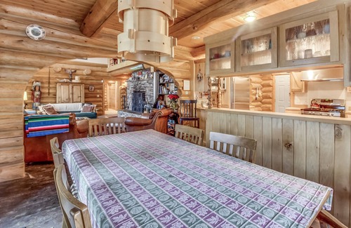 Sandpoint House | Lakefront true log home w/private hot tub, dock & heated floors