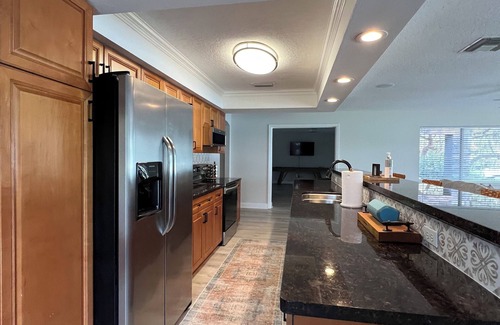 Florida South Atlantic Coast House | Lakehouse with pool in quiet setting