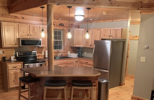 Elmira Cabin | Lakes of the North Cabin near trails - Access to Clubhouse with Pool and Hot Tub