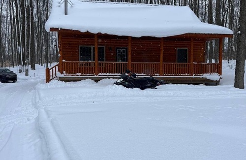 Elmira Cabin | Lakes of the North Cabin near trails - Access to Clubhouse with Pool and Hot Tub