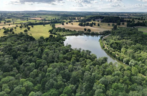 Nunney RV Rental | Lakeside Bell Tent - Canvas Suite at Marston Park