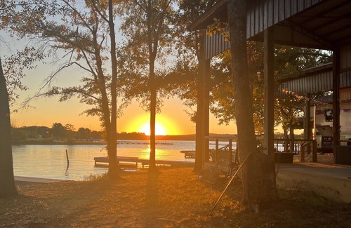 Lincoln RV Rental | Lakeside Comfort: Covered RV Site with Private Pier #1