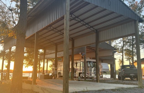 Lincoln RV Rental | Lakeside Comfort: Covered RV Site with Private Pier #1