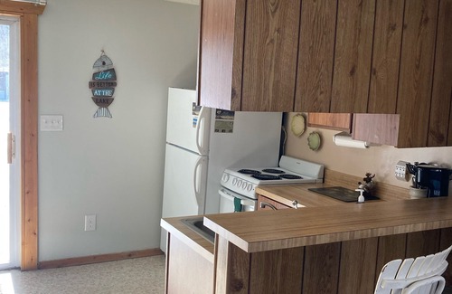 Oscoda House | Lakeside condo